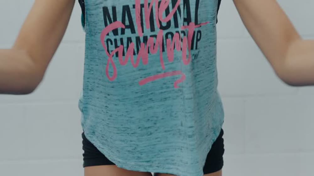 Close-up of a camper's tank top reading National Championship at Competitors Camp 2026