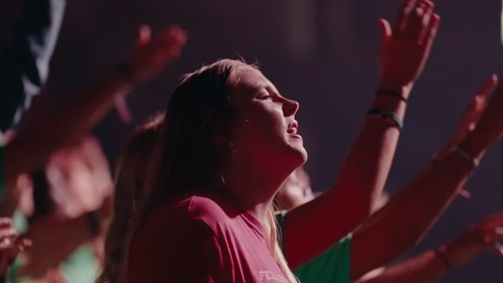An athlete in worship during the week