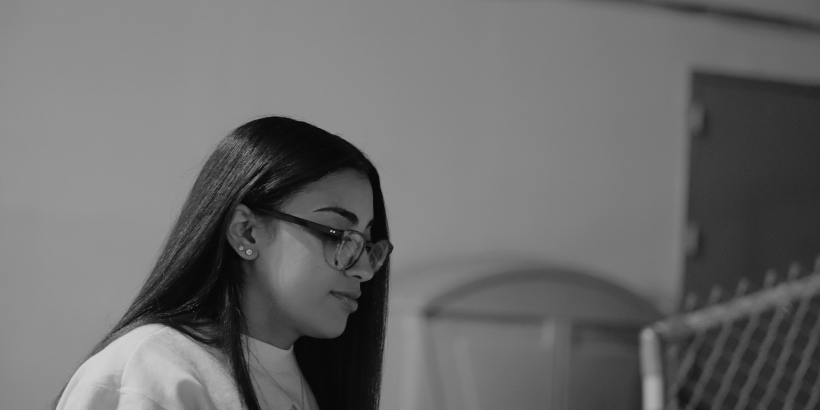 A student in profile during her interview