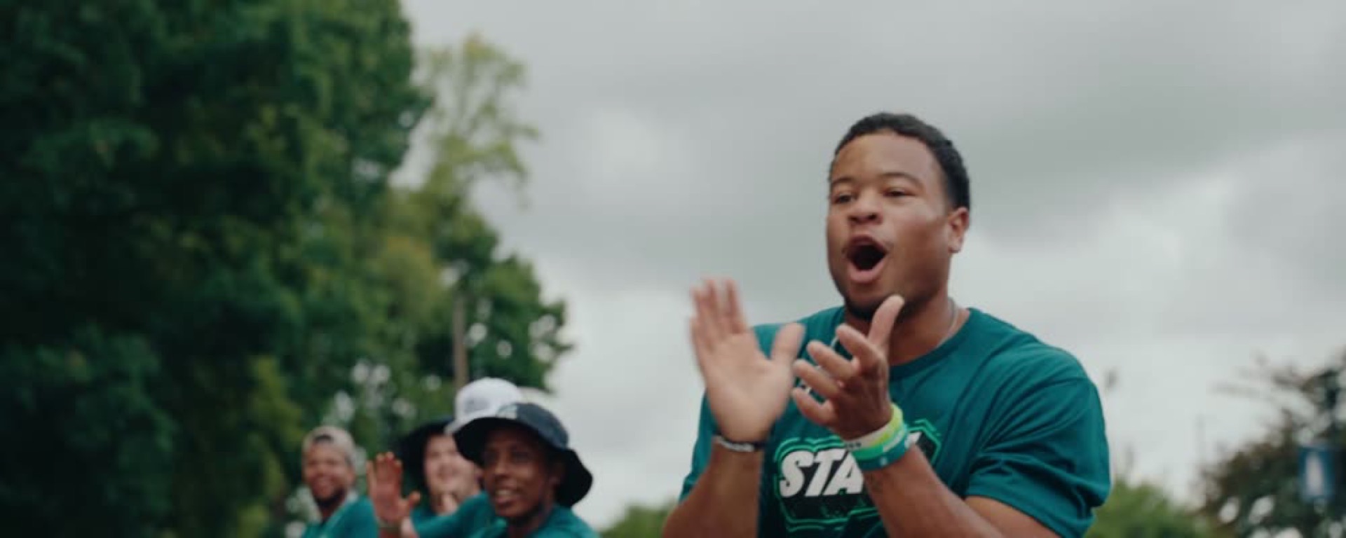 A camp leader cheering at FCA Competitors Camp